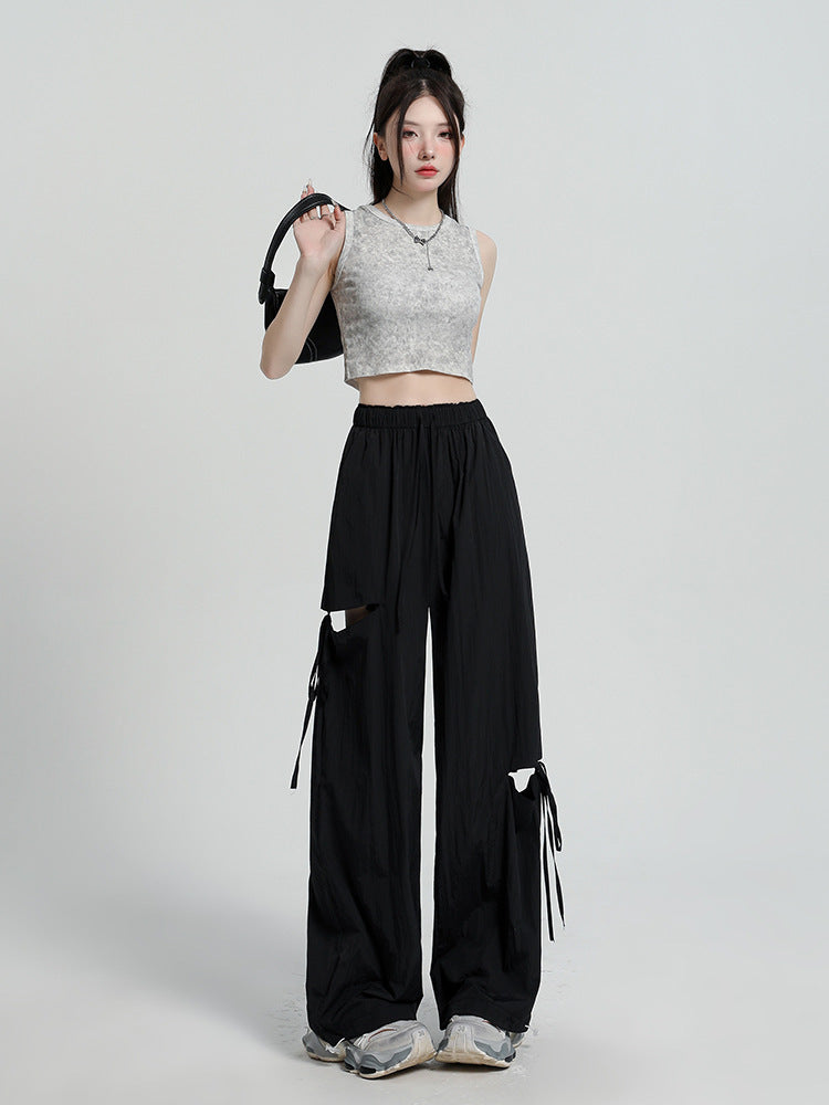 カットアウト レディース パンツ ボトムス ロングパンツ ワイドパンツ ロング ワイド ストレート フェミニン ストリート リボン ポケット ウエストゴム ドロスト アメカジ かわいい 大人可愛い シンプル カジュアル おしゃれ こなれ感 ラフ 抜け感 キュート 無地 春 夏 秋 学生 学校 通学 デート お出かけ アウトドア 旅行 公園 女子会 休日 ライブ カフェ フェス 韓国 オルチャン コーデ 楽ちん 体型カバー 普段使い 着回し インスタ映え S M L XL ブラック カーキ 水色 ネイビー