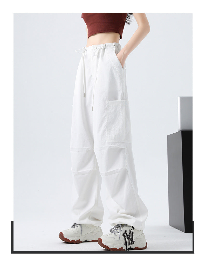 パラシュートパンツ レディース パンツ ボトムス ロングパンツ ワイドパンツ カーゴパンツ 丈長 ロング ワイド ストリート ポケット ハイウエスト ウエストゴム ドロスト ボタン アメカジ シンプル カジュアル おしゃれ かっこいい メンズライク ボーイッシュ ルーズ クール ナチュラル 無地 春 夏 ママ 通勤 学生 学校 通学 デート お出かけ 旅行 公園 女子会 休日 ショッピング お花見 カフェ 普段使い 着回し S M L XL ブラック ダークグレー カーキ ベーシックカラー