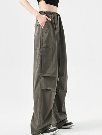 パラシュートパンツ レディース パンツ ボトムス ロングパンツ ワイドパンツ カーゴパンツ 丈長 ロング ワイド ストリート ポケット ハイウエスト ウエストゴム ドロスト ボタン アメカジ シンプル カジュアル おしゃれ かっこいい メンズライク ボーイッシュ ルーズ クール ナチュラル 無地 春 夏 ママ 通勤 学生 学校 通学 デート お出かけ 旅行 公園 女子会 休日 ショッピング お花見 カフェ 普段使い 着回し S M L XL ブラック ダークグレー カーキ ベーシックカラー