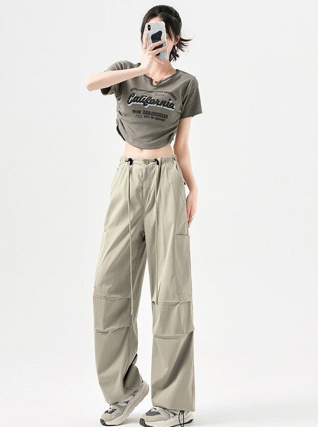 パラシュートパンツ レディース パンツ ボトムス ロングパンツ ワイドパンツ カーゴパンツ 丈長 ロング ワイド ストリート ポケット ハイウエスト ウエストゴム ドロスト ボタン アメカジ シンプル カジュアル おしゃれ かっこいい メンズライク ボーイッシュ ルーズ クール ナチュラル 無地 春 夏 ママ 通勤 学生 学校 通学 デート お出かけ 旅行 公園 女子会 休日 ショッピング お花見 カフェ 普段使い 着回し S M L XL ブラック ダークグレー カーキ ベーシックカラー