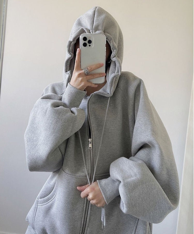 ジップアップパーカー レディース トップス アウター 上着 ミディアム 長袖 ボリューム袖 ドロップショルダー フード オーバーサイズ ストリート ファスナー ポケット 前開き アメカジ シンプル カジュアル かっこいい こなれ感 ラフ ボーイッシュ 抜け感 無地 春 秋 ユニセックス ママ 学生 学校 通学 お出かけ イベント 旅行 ジム 公園 休日 ライブ カフェ 重ね着 韓国 コーデ 体型カバー 普段使い S M L XL 2XL 3XL 4XL 5XL 大きいサイズ ゆったり 黒 グレー