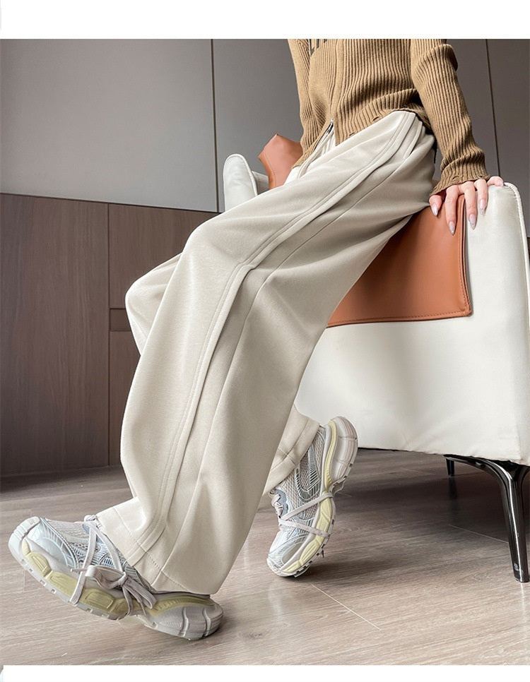 レディース パンツ ボトムス ロングパンツ ワイドパンツ ロング ワイド ストレート 裾ワイド ポケット ハイウエスト ウエストゴム 薄手 大人可愛い シンプル カジュアル おしゃれ かっこいい こなれ感 個性的 主役級 存在感 都会的 無地 秋 冬 ロングシーズン ママ デート お出かけ 旅行 合コン 韓国 オルチャン 体型カバー 美脚 脚長 普段使い 着回し モテ 清楚 流行 インスタ映え 定番 S M L XL 2XL 大きいサイズ 黒 ブラック グレー ワインレッド アプリコット ネイビー