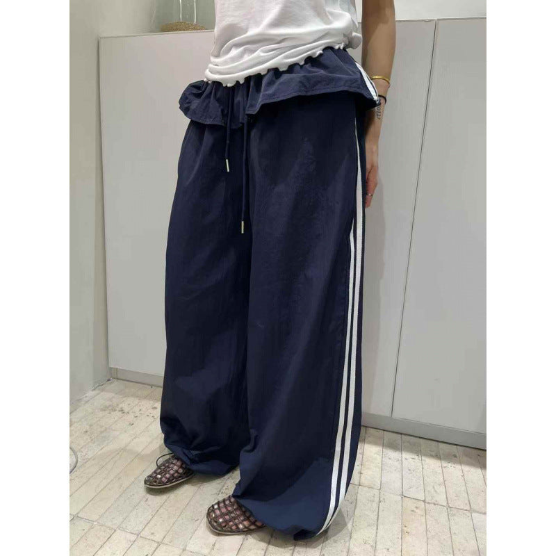 レディース パンツ ボトムス ロングパンツ ロング ワイド フレア ストレート Iライン フリル ポケット ハイウエスト ウエストゴム 薄手 大人可愛い シンプル カジュアル おしゃれ かっこいい こなれ感 ラフ ボーイッシュ スポーティー 個性的 主役級 存在感 春 夏 秋 冬 ロングシーズン ママ デート お出かけ 旅行 ジム 公園 女子会 合コン 重ね着 韓国 オルチャン 楽ちん 体型カバー 普段使い 着回し レイヤード インスタ映え フリーサイズ 白 ホワイト 黒 ブラック