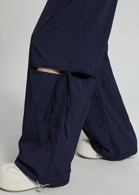 カットアウト レディース パンツ ボトムス ロングパンツ ワイドパンツ ロング ワイド ストレート フェミニン ストリート リボン ポケット ウエストゴム ドロスト アメカジ かわいい 大人可愛い シンプル カジュアル おしゃれ こなれ感 ラフ 抜け感 キュート 無地 春 夏 秋 学生 学校 通学 デート お出かけ アウトドア 旅行 公園 女子会 休日 ライブ カフェ フェス 韓国 オルチャン コーデ 楽ちん 体型カバー 普段使い 着回し インスタ映え S M L XL ブラック カーキ 水色 ネイビー