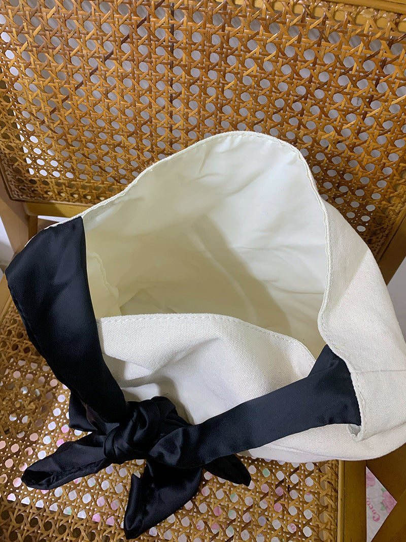 バッグ ショルダー 肩がけ 大容量 便利 リボン かわいい 大人可愛い きれいめ シンプル カジュアル 上品 お洒落 キュート 無地 オフィス OL 通勤 デート お出かけ 運動 アウトドア イベント 旅行 お買い物 女子会 スポーツ 休日 普段使い コーデ モテ 春 夏 秋 冬 お食事会 白 レディース 手持ち 便利 コンパクト 軽量 スリム 自立 こなれ感 ラフ スポーティー ラブリー パーティー リゾート 普段使い 韓国 コーデ スタイル 高見え モテ インスタ映え シーズンレス お食事会