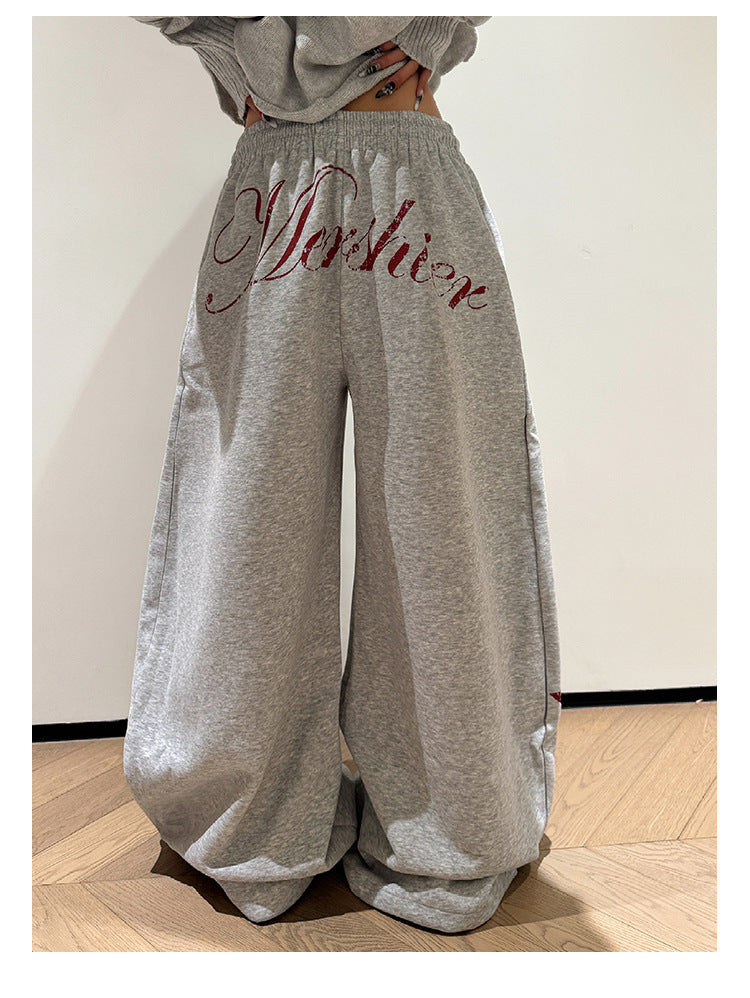 レディース パンツ ボトムス ロング ワイド 裾ワイド ポケット ハイウエスト ウエストゴム おしゃれ かっこいい エスニック エキゾチック こなれ感 メンズライク マニッシュ ボーイッシュ 個性的 主役級 存在感 抜け感 ロゴ 春 夏 秋 冬 ロングシーズン ママ デート お出かけ アウトドア キャンプ 旅行 公園 合コン 韓国 オルチャン 暖かい 防寒 体型カバー 普段使い モテ 清楚 インスタ映え 定番 S M L XL 2XL ゆったり ゆる 黒 ブラック グレー