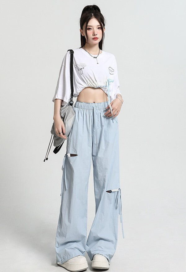 カットアウト レディース パンツ ボトムス ロングパンツ ワイドパンツ ロング ワイド ストレート フェミニン ストリート リボン ポケット ウエストゴム ドロスト アメカジ かわいい 大人可愛い シンプル カジュアル おしゃれ こなれ感 ラフ 抜け感 キュート 無地 春 夏 秋 学生 学校 通学 デート お出かけ アウトドア 旅行 公園 女子会 休日 ライブ カフェ フェス 韓国 オルチャン コーデ 楽ちん 体型カバー 普段使い 着回し インスタ映え S M L XL ブラック カーキ 水色 ネイビー