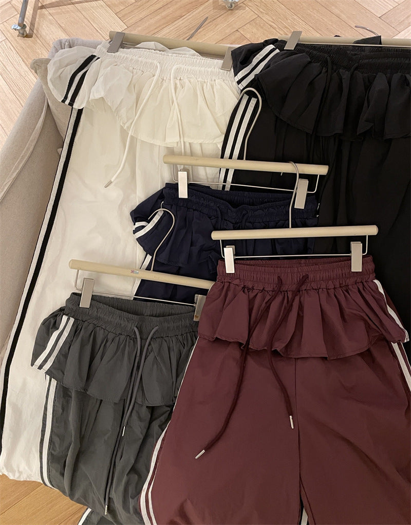 レディース パンツ ボトムス ロングパンツ ロング ワイド フレア ストレート Iライン フリル ポケット ハイウエスト ウエストゴム 薄手 大人可愛い シンプル カジュアル おしゃれ かっこいい こなれ感 ラフ ボーイッシュ スポーティー 個性的 主役級 存在感 春 夏 秋 冬 ロングシーズン ママ デート お出かけ 旅行 ジム 公園 女子会 合コン 重ね着 韓国 オルチャン 楽ちん 体型カバー 普段使い 着回し レイヤード インスタ映え フリーサイズ 白 ホワイト 黒 ブラック
